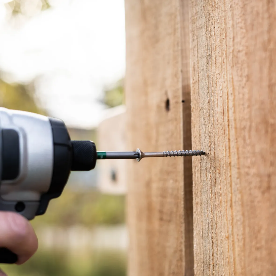Star Drive Screw Being Inserted Into Fence Board