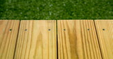 torx drive screws holding down treated pine decking