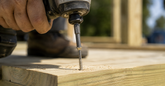 man driving the right wood screw for his project